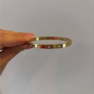 Kate Spade Elegant Gold Bangle with Crystals